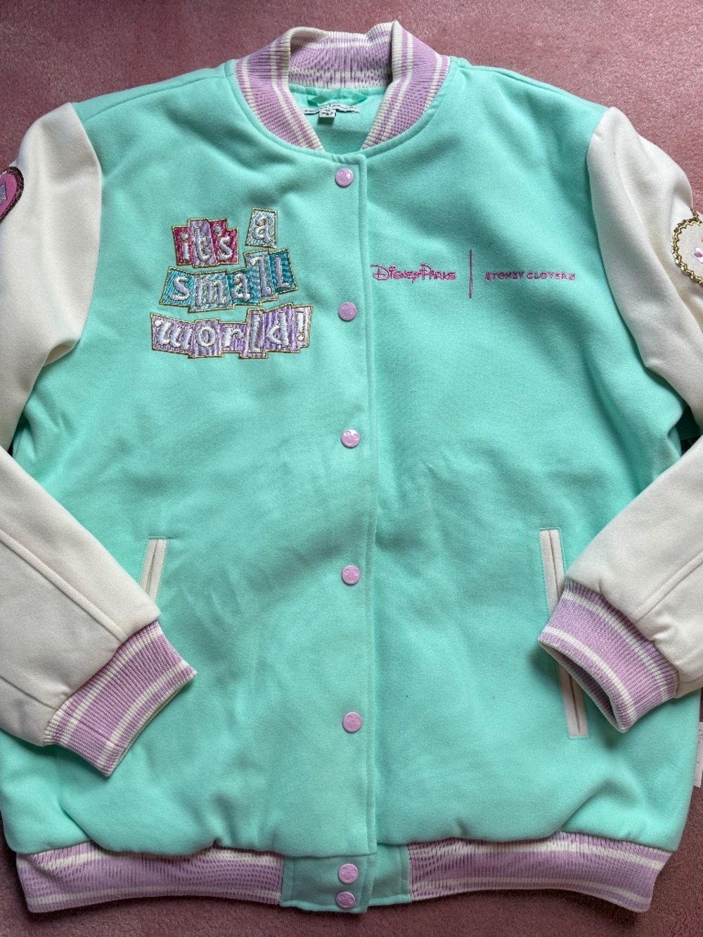Disney Stoney clover it’s a small world varsity jacket